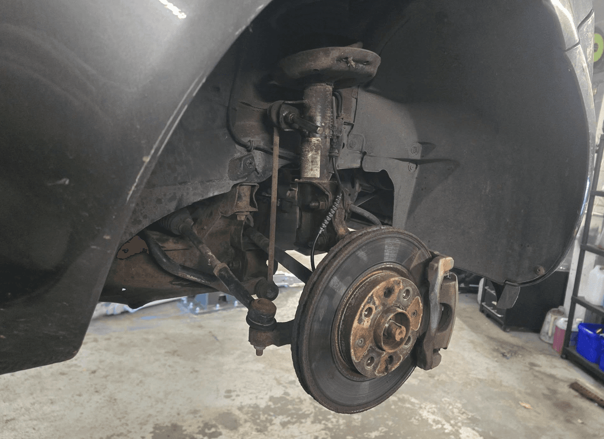 Mechanic working on a car