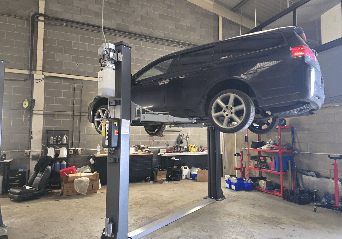 Mechanic working on a car